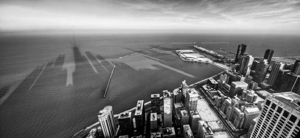 High angle view of boats in sea against sky