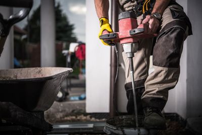 Man working on metal structure