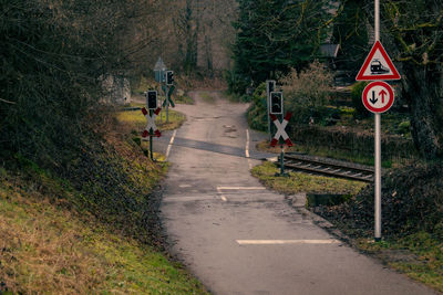 Road sign on footpath in city