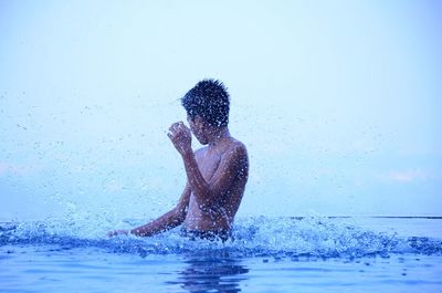 Woman swimming in water