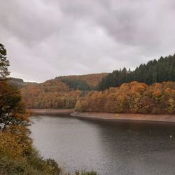 Scenic view of lake against sky during autumn