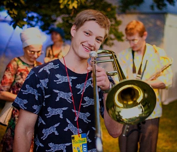 child, musical instrument, music, men, childhood, boys, brass instrument, arts culture and entertainment, playing, males, front view, holding, togetherness, trumpet, leisure activity, casual clothing, group of people, smiling, brass, musician
