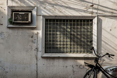 Low angle view of window of old building