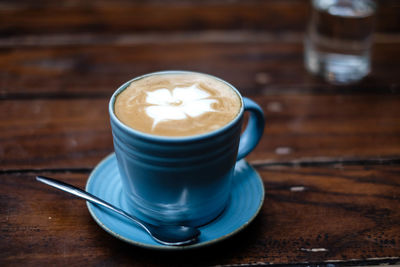 Close-up of cappuccino on table