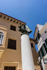 Low angle view of residential building against clear sky