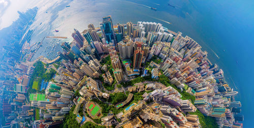 High angle view of modern buildings in city against sky