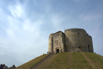 Low angle view of fort against sky