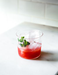 Close-up of red fruit in glass