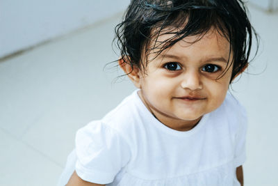 Portrait of cute girl smiling