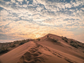 Scenic view of desert against sky