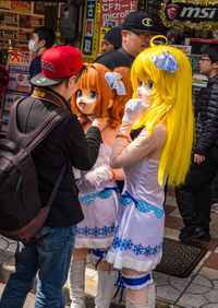 Group of people at street market