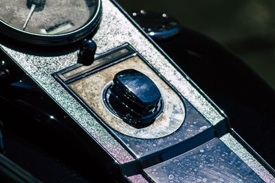 High angle view of old machine on table