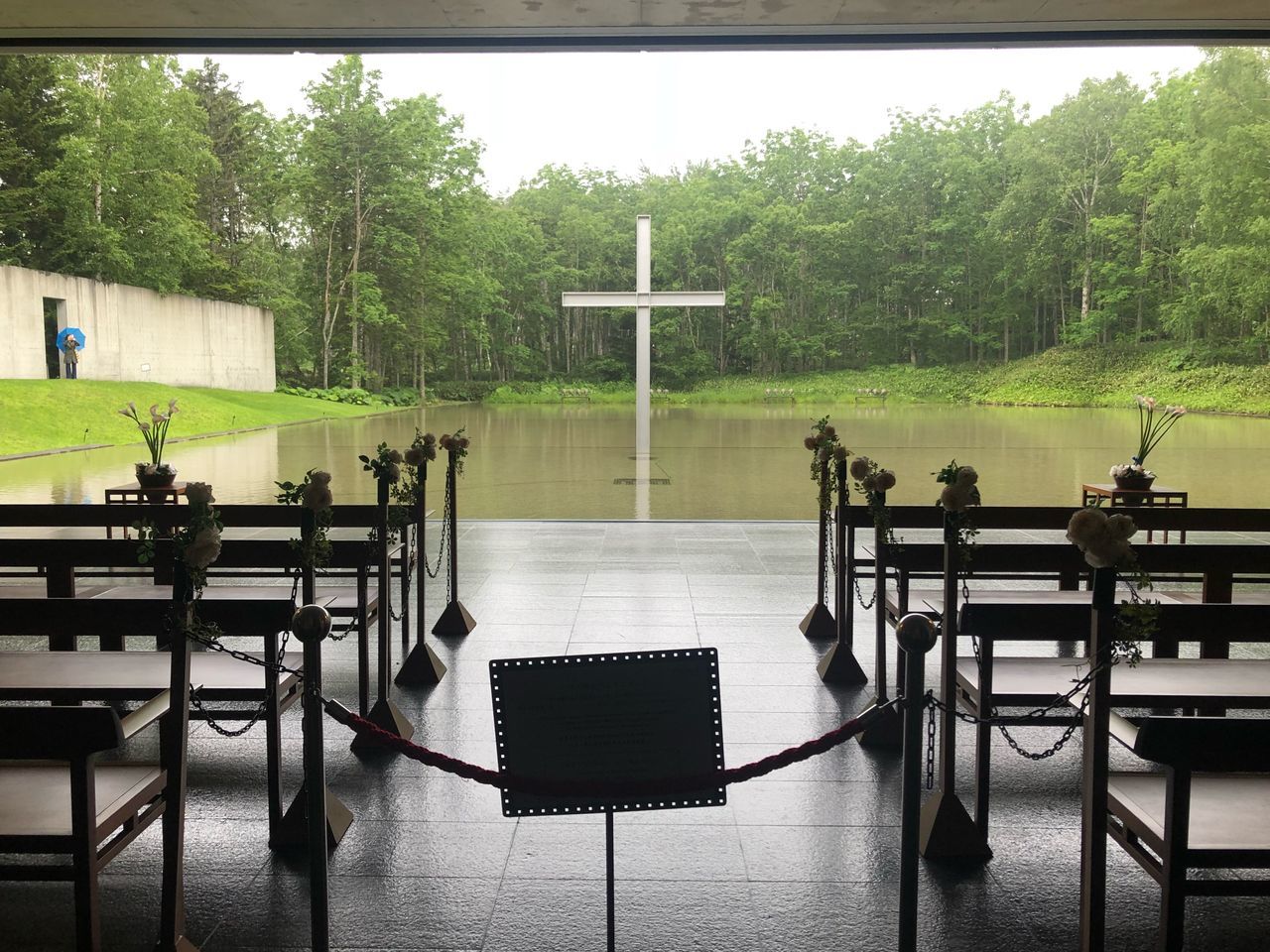 tree, table, plant, seat, no people, absence, chair, day, empty, nature, indoors, cross, furniture, architecture, flooring, religion, belief, water, reflection