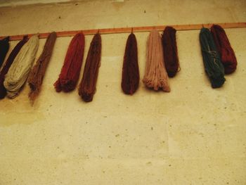 High angle view of shoes hanging on floor