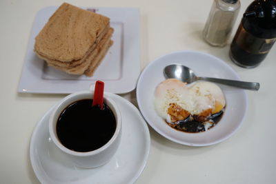 Close-up of breakfast served on table