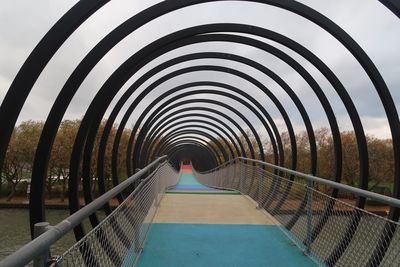 View of footbridge against sky