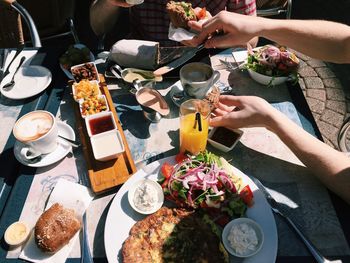 Close-up of cropped hand holding food