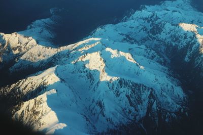 Scenic view of snow covered mountains