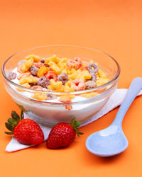 Colorful bowl of cereal with strawberries