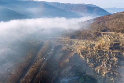 Aerial view of mountains against sky