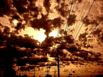 Scenic view of cloudy sky at sunset