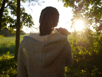 Rear view of woman outdoors