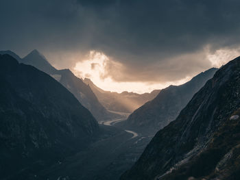 Scenic view of mountains against sky during sunset