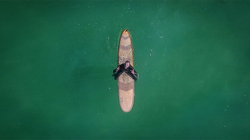 High angle view of people on boat in sea