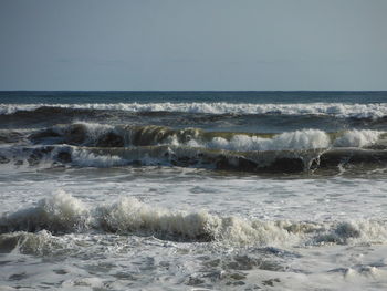 Scenic view of sea against clear sky