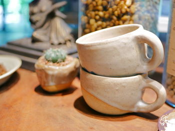 Close-up of coffee cup on table