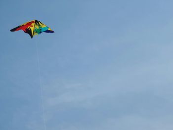 Low angle view of multi colored balloons