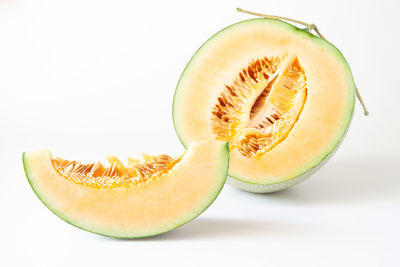 Close-up of banana against white background