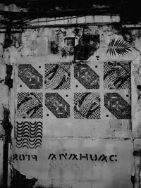 Close-up of text on wall