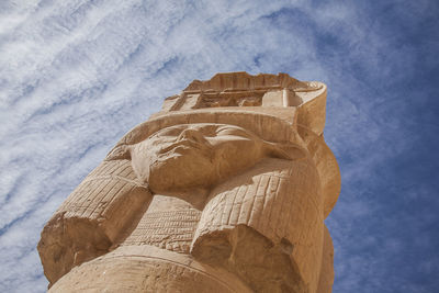 Low angle view of statue against sky