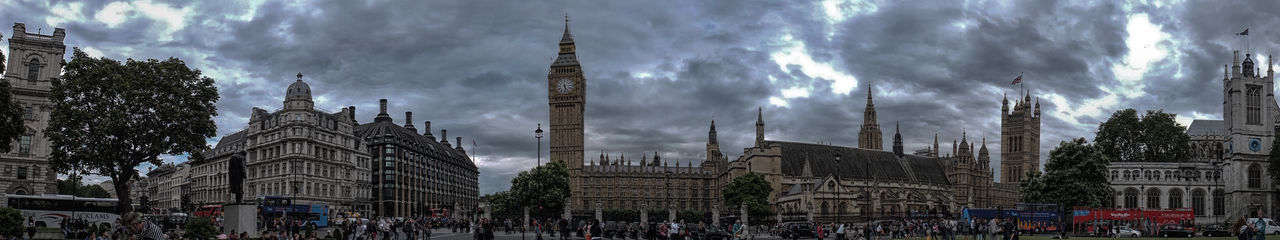 Low angle view of building against cloudy sky