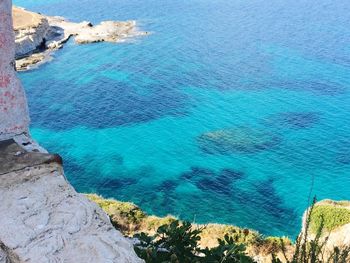 High angle view of beach against blue sky