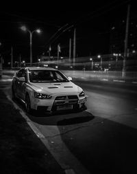 Cars on road at night