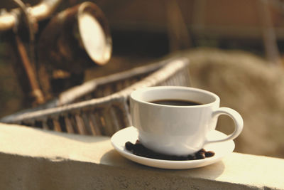 Close-up of coffee cup on table