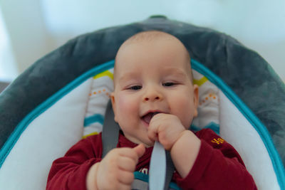 Close-up of cute baby boy smiling