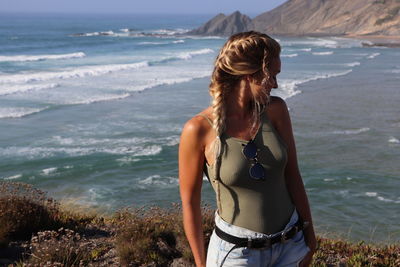 Woman standing at beach