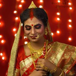 Portrait of woman with illuminated lighting equipment