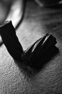 High angle view of black and spoon on table