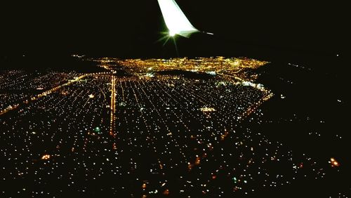 Airplane in mid air at night