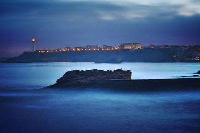 City on seashore at night