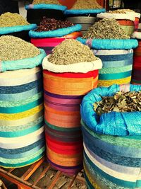 Stack of multi colored vegetables for sale at market stall