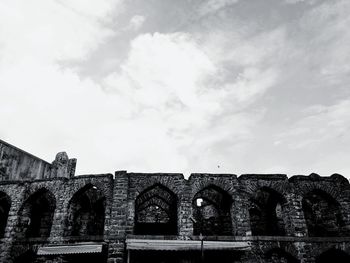 Low angle view of historic building against sky