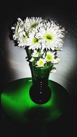 Close-up of flower vase on table