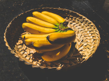 High angle view of fruit in basket on table