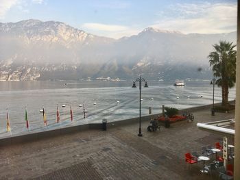 High angle view of sea against mountains