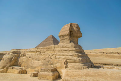 Sphinx against clear blue sky